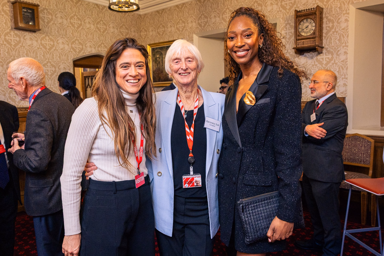 Three women smiling