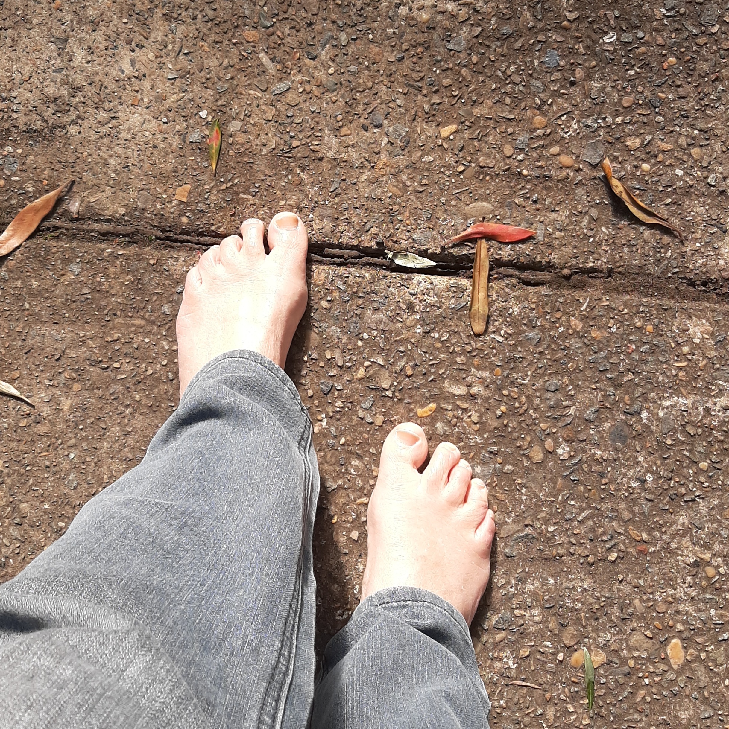 Ruth is walking barefoot